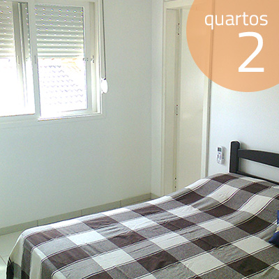 Suite com ar condicionado.