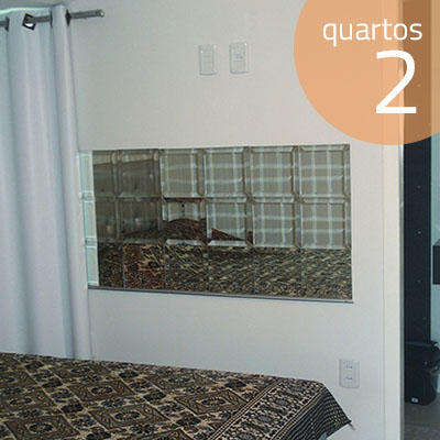 Suite com ar condicionado.